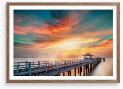 Dramatic pier sunset
