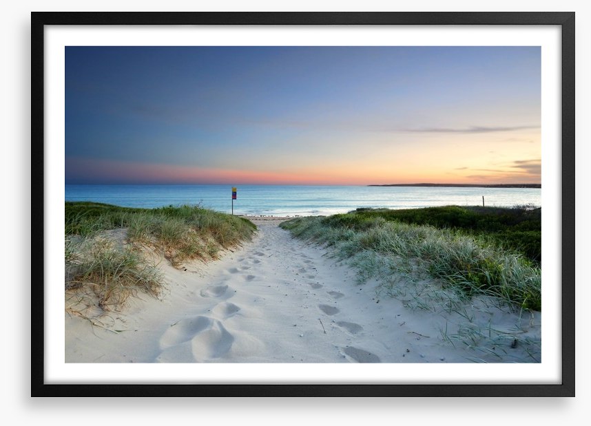 Sandy beach trail at sundown