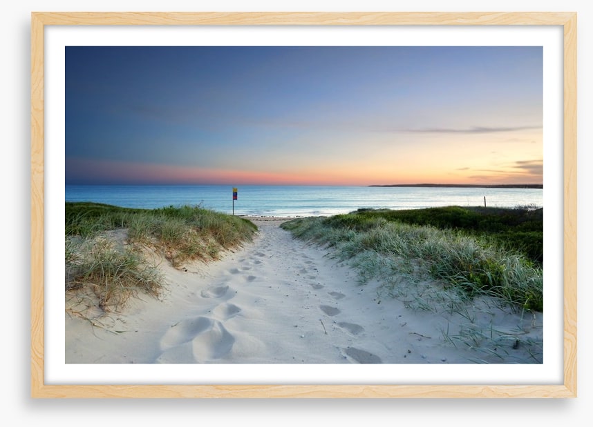 Sandy beach trail at sundown