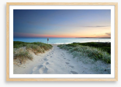 Sandy beach trail at sundown