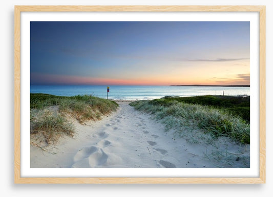 Sandy beach trail at sundown