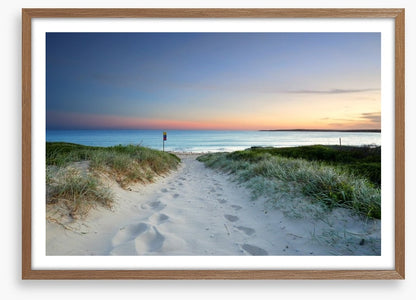 Sandy beach trail at sundown