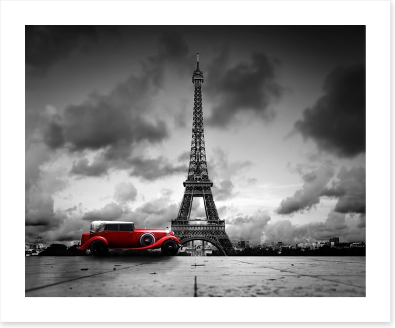 The Eiffel Tower and red car