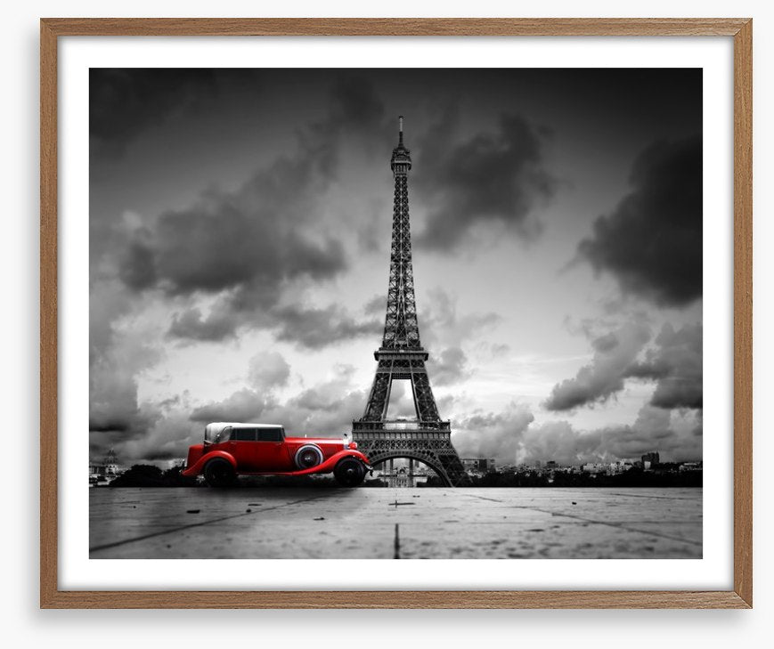 The Eiffel Tower and red car