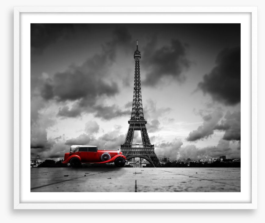 The Eiffel Tower and red car