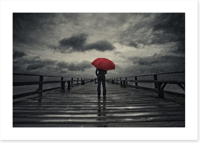 Red umbrella in the storm