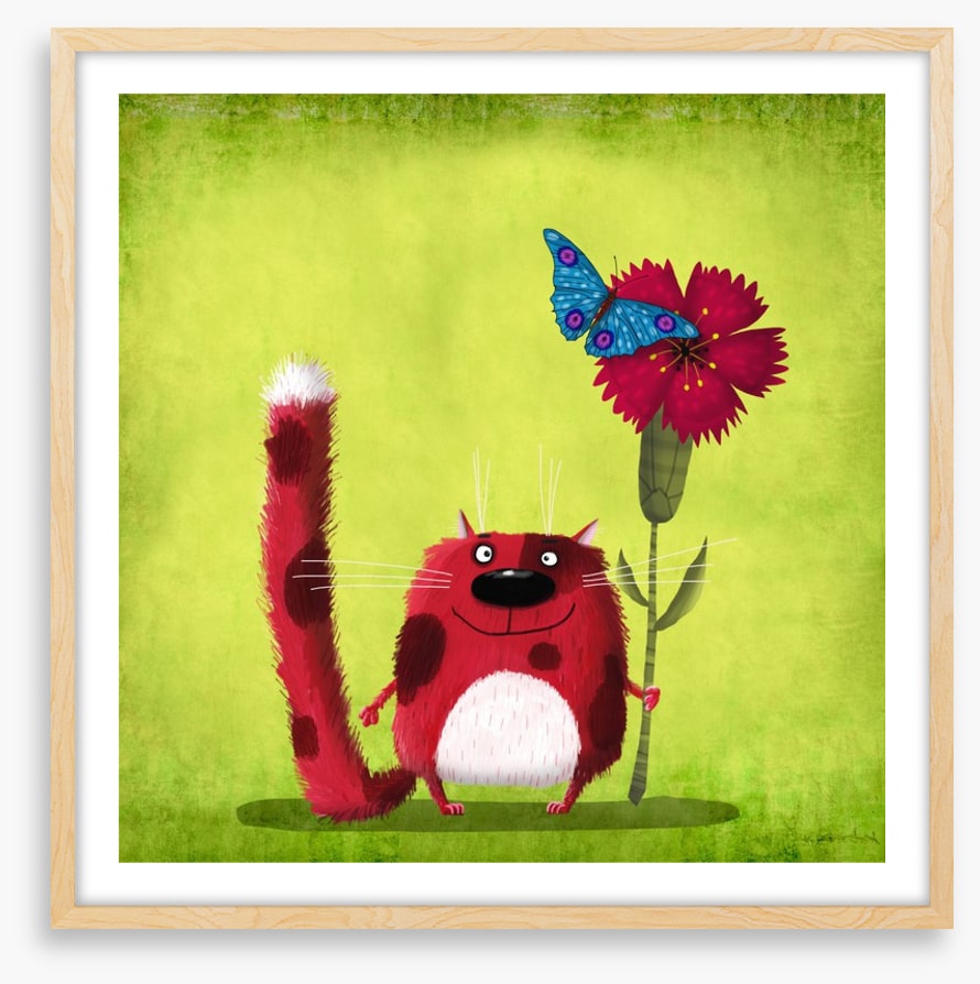 Red cat with cornflower