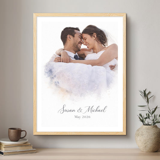 Framed photograph of a couple in wedding attire with 'Susan & Michael' and 'May 2026' text, displayed on a wall.