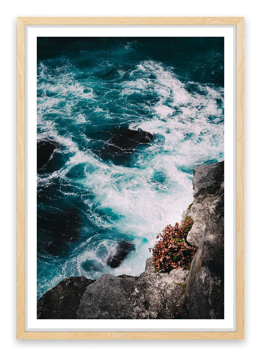 Below the ocean cliff