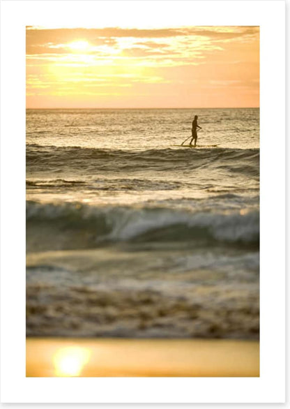 Avalon beach paddle boarder at sunrise