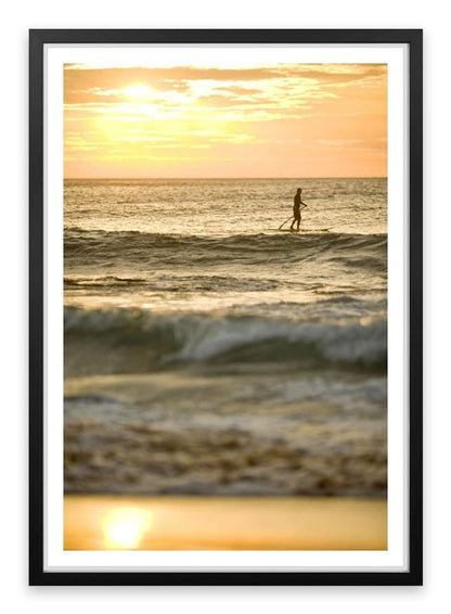 Avalon beach paddle boarder at sunrise