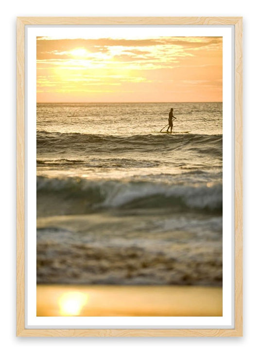 Avalon beach paddle boarder at sunrise