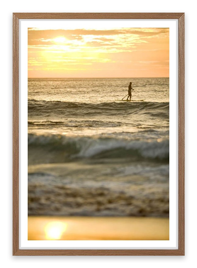 Avalon beach paddle boarder at sunrise